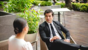 Family member discussing high-functioning addiction with an addiction treatment professional